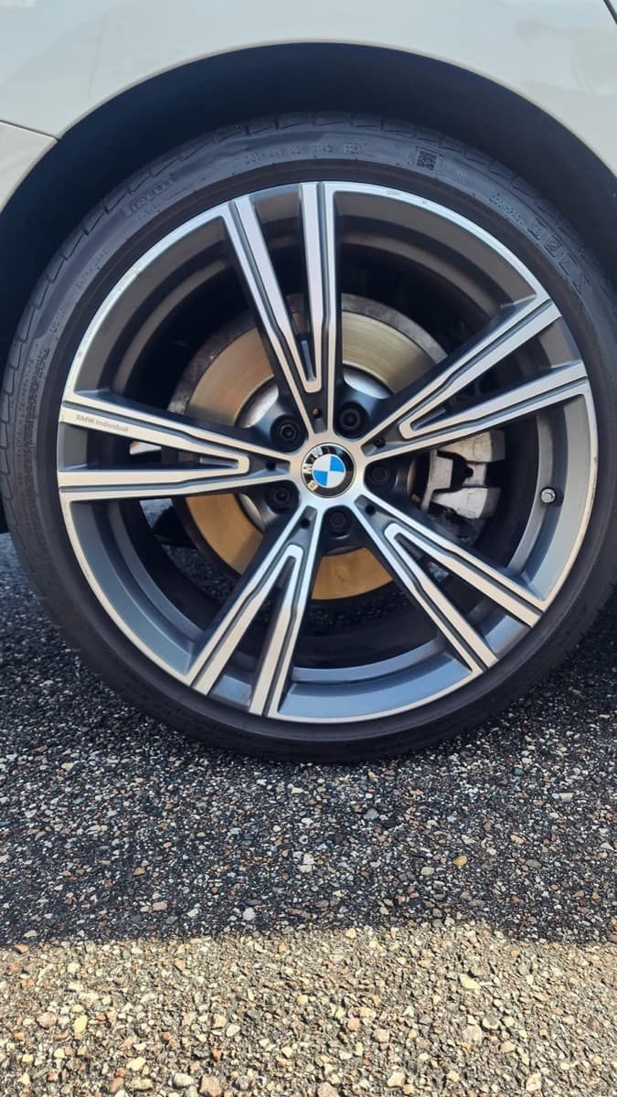 Clean BMW alloy wheel and tire after exterior detailing