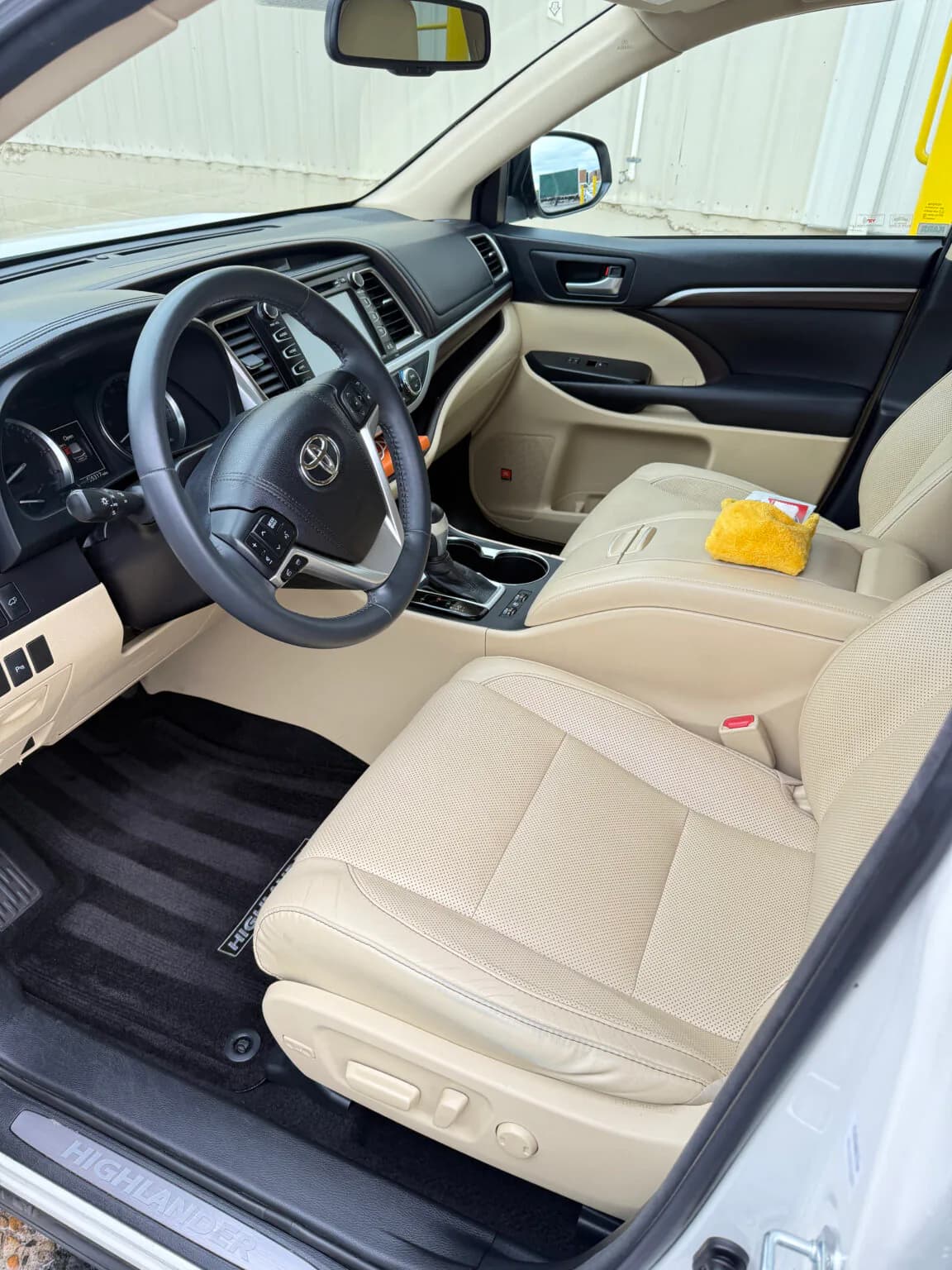 Clean beige Toyota Highlander front cabin after interior detailing